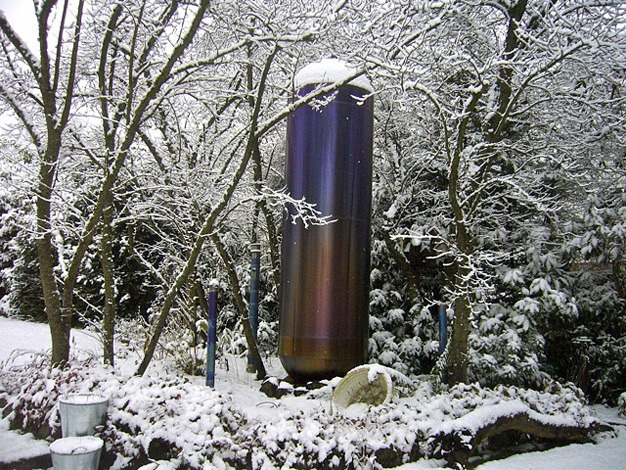 Snow blankets a Saturn rocket fuel tank