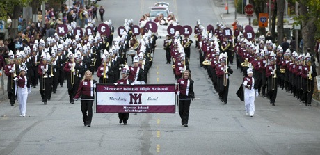 The Mercer Island High School marching band showcases their brand new uniforms during the annual MIHS Homecoming parade that took place downtown on Friday evening