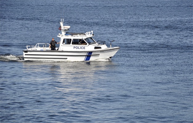 A Mercer Island Marine Patrol boat monitors the waters around the Island during the Summer Celebration weekend.