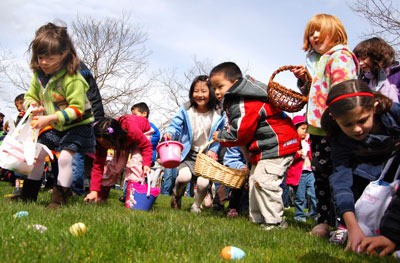 Children dash for eggs during last Saturday's Lil' Ones Easter Egg hunt at Mercerdale Field.