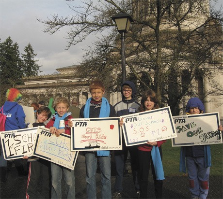 RALLY FOR SCHOOLS. Members of the Huginin