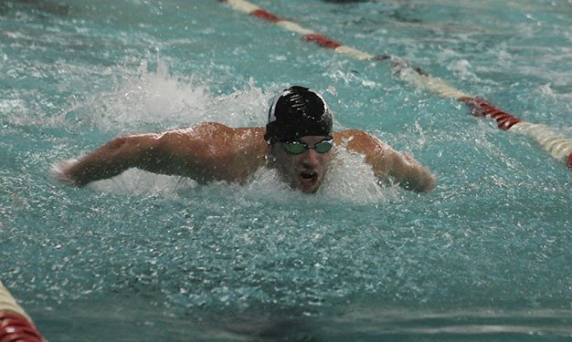 Mercer Island’s Andrew Weiss swims the 100 butterfly Tuesday