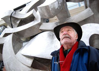 Washington sculptor Harold Balazs stands in front of his latest work of art