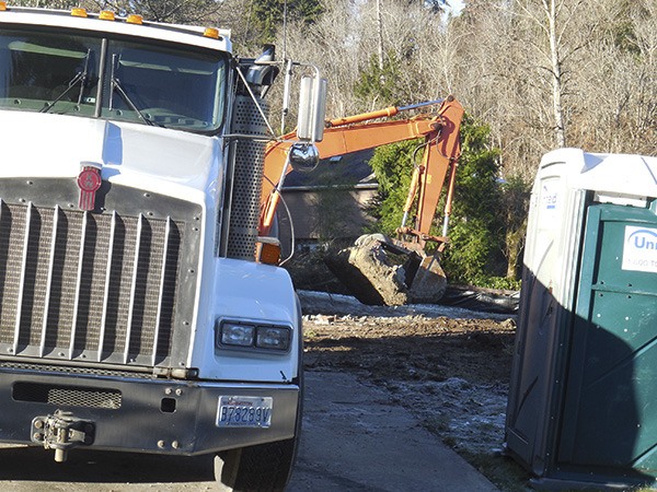 Older homes like this one in the 3700 block of 77th Avenue S.E. are being demolished to make way for new construction.