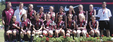 The Mercer Island FC U14 team recently won the championship at the 2010 Nike Crossfire select tournament. The team includes: (back row) Head Coach Bryan Mazza