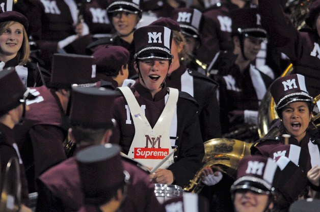 Members of the Mercer Island High School Marching Band react to the news they will participate in the the Rose Bowl parade in Pasadena