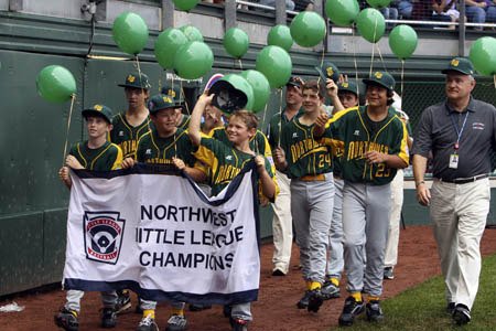 The Mercer Island Boys and Girls Club Little League team walk in the Little League World Series Parade in August.