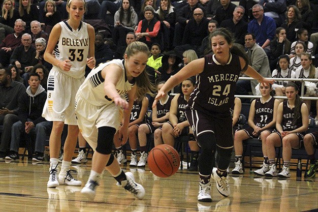 Mercer Island’s Julia Blumenstein (24) reacts after losing the ball to Bellevue’s Mandy Steward Friday