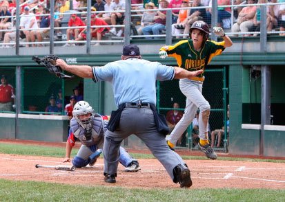 Aidan Plummer slides into home during Mercer Island Little League's Aug. 23 game against Iowa's Urbandale LL at the Little League World Series in Williamsport