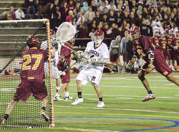 Mercer Island midfielder Cooper Johnson attempts to shoot against Lakeside High School Friday