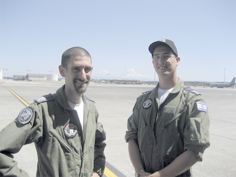 Israeli team Flight Engineer Captain Tomer and air crew Captain Amit of the Israeli Air Force (no last names given for security reasons) take a break on the airstrip tarmac at McChord Air Force Base. The pair is part of a 30-member delegation that competed in the 2009 Air Mobility RODEO. The team was awarded the 2009 Colonel Joe Jackson Award for Best C-130 Hercules air crew.