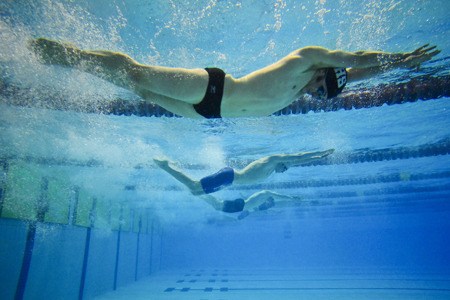 Photographer Chad Coleman won first place in the WNPA 2010 Better Newspapers Contest Best Sports Action Photo category for this picture of an Islander swimmer's final at the team's fifth state championship last February.