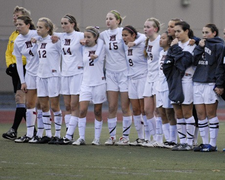 The Islanders line up for the game-deciding shootout against Columbia River in the 3A girls state championship soccer match.