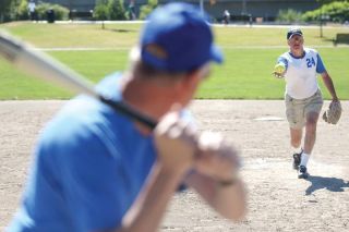 Chad Coleman/Mercer Island Reporter Rockers’ pitcher John Weinberg gives a toss to the plate against Renton July 10 as Mercer Island stormed back from a 12-6 deficit to take a 13-12 lead. Renton won the game 14-13.