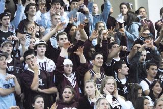 Chad Coleman/Mercer Island Reporter Islander basketball fans try to throw some voodoo at Bellevue.