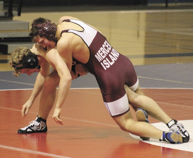 Mercer Island's Nicholas Chandler beat Juanita's Chase Miller by major decision 11-3. The Islanders beat both Juanita and Lake Washington during a double dual meet at Juanita High School on Thursday