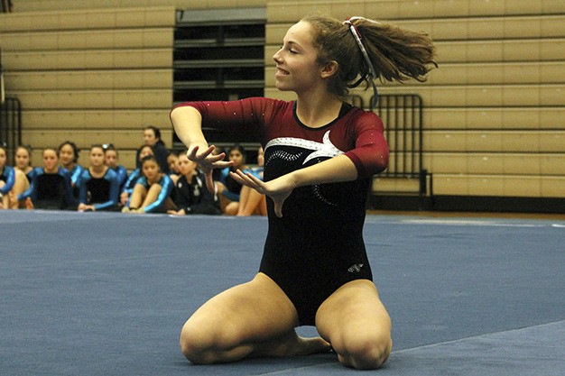 Mercer Island’s Catherine Seiftert performs her floor routine Thursday