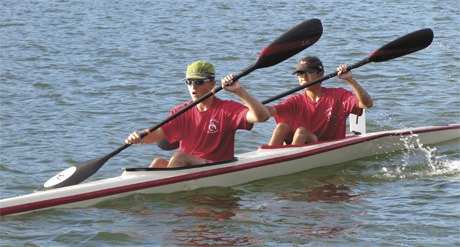 Mercer Island residents Michael Weyna and Caleb Chuck compete in the K-2 flat water sprint race. The duo rows with the Cascade Canoe and Kayak Center