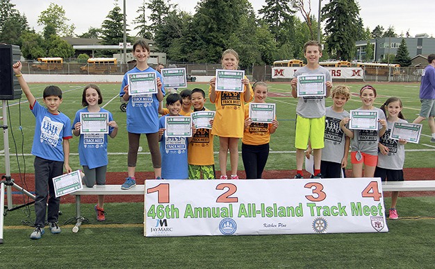 The 4th grade 4x100 relay placers take the podium at the 46th annual All-Island Track Meet June 17 at Islander Stadium. West Mercer won the meet for the fourth year in a row.