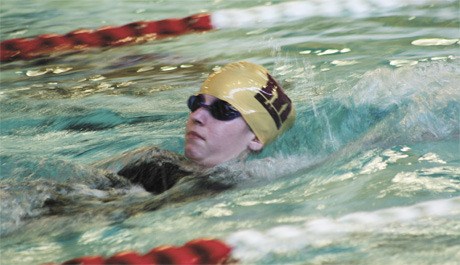 Mercer Island’s Mia Chasan finishes up the backstroke portion of the 200-yard individual medley race.