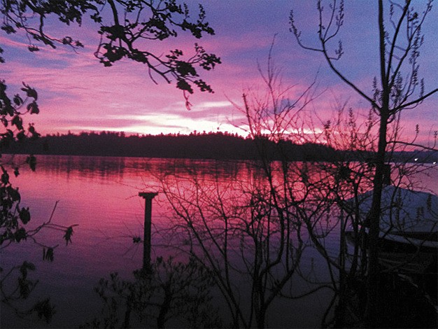 Mercer Island resident Patti Brewer captured this red sky picture at sunset last Thursday from her garden on the western side of the Island. She wrote in an e-mail