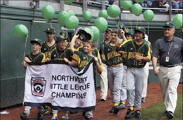 The Mercer Island All-Stars parade in on the first day of pool play at the 2009 Little League World Series in Williamsport
