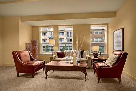 The living room in one of the 7800 Plaza show condos.