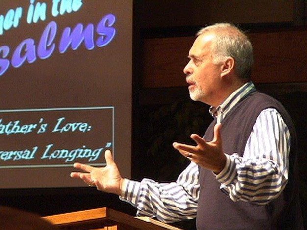 Pastor Greg Asimakoupoulos speaks during an event.