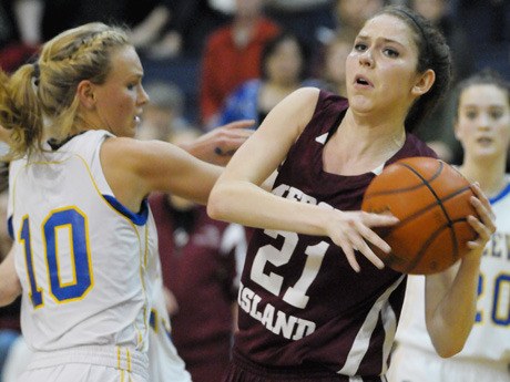 Islander Kate DaPron (21) grabs a rebound at Bellevue on Wednesday