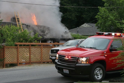 Firefighters from Bellevue and Mercer Island responded to a fire early this morning at a home in the 3600 block of 86th Avenue S.E. on Mercer Island. Media reports said that the smoke could be seen from Bellevue. Everyone in the home got out safely.