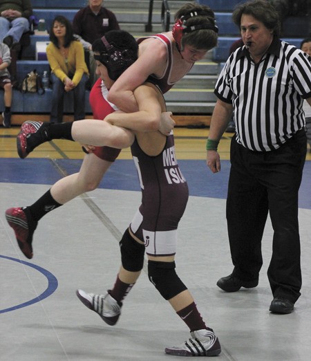 Mercer Island's Taylan Yuasa picks up his Mount Si opponent during his match at the KingCo tournament on Saturday