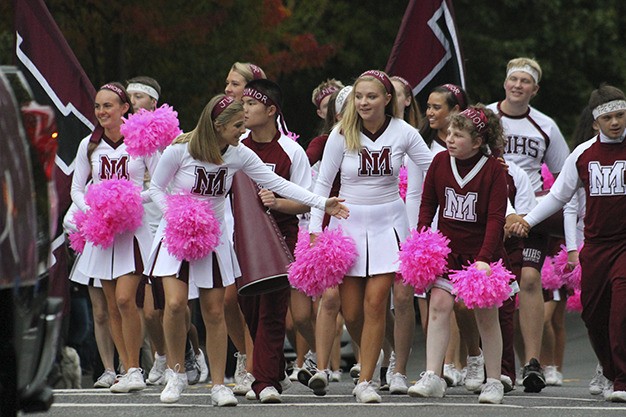 Mercer Island High School cheerleaders and Sparkle Squad members dazzled spectators during the 2015 Homecoming Parade Friday