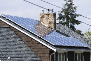 A Mercer Island home features east-facing solar roof panels.