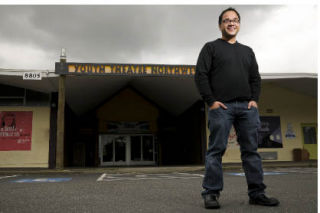 YTN executive director Manuel Cawaling stands in front of the theatre.