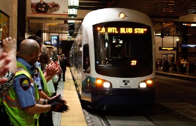 A Sound Transit light-rail train pulls into Westlake Station July 18 for the service's inaugural ride to Tukwila. Completion of a connection to the Sea-Tac International Airport is expected in December.