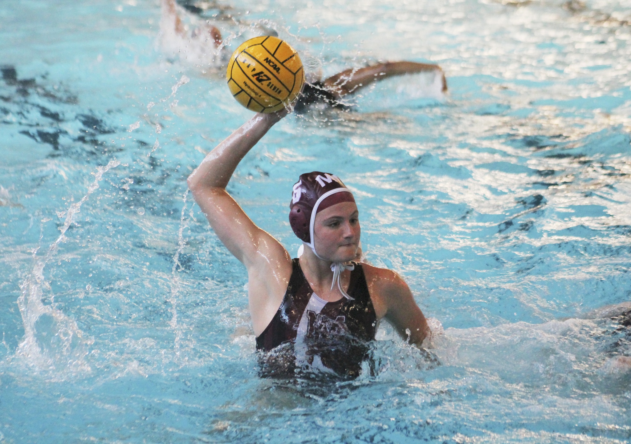 Mercer Island’s Heather Robinson unleashes a shot against Inglemoor Friday at Mary Wayte Pool. Robinson scored three goals as the Islanders won 11-3 (Joe Livarchik/staff photo).