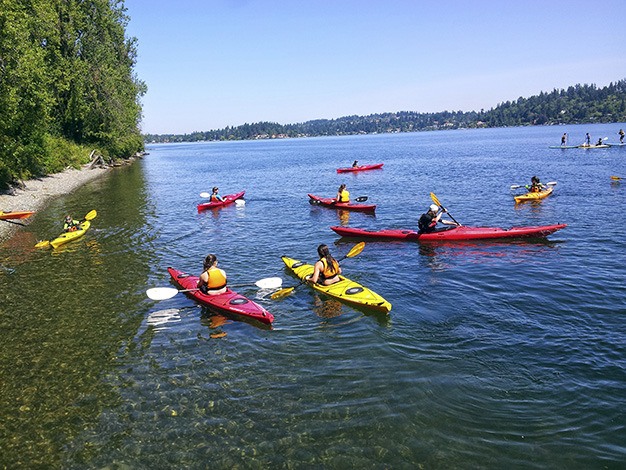 Kayakers gather offshore at Luther Burbank Park. Kayaking is among the more popular courses offered through Mercer Island Parks and Recreation's boating program.