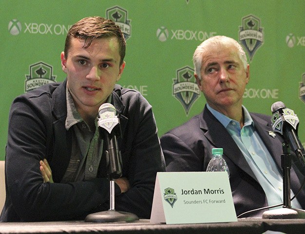 New Seattle Sounders FC forward Jordan Morris addresses the media alongside Sounders coach Sigi Schmid (right) Thursday