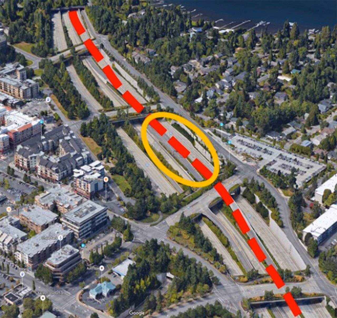 This aerial view of the stretch of I-90 by Mercer Island’s Town Center shows the light rail alignment (dotted line) and planned station area (circled). Photo courtesy of the city of Mercer Island