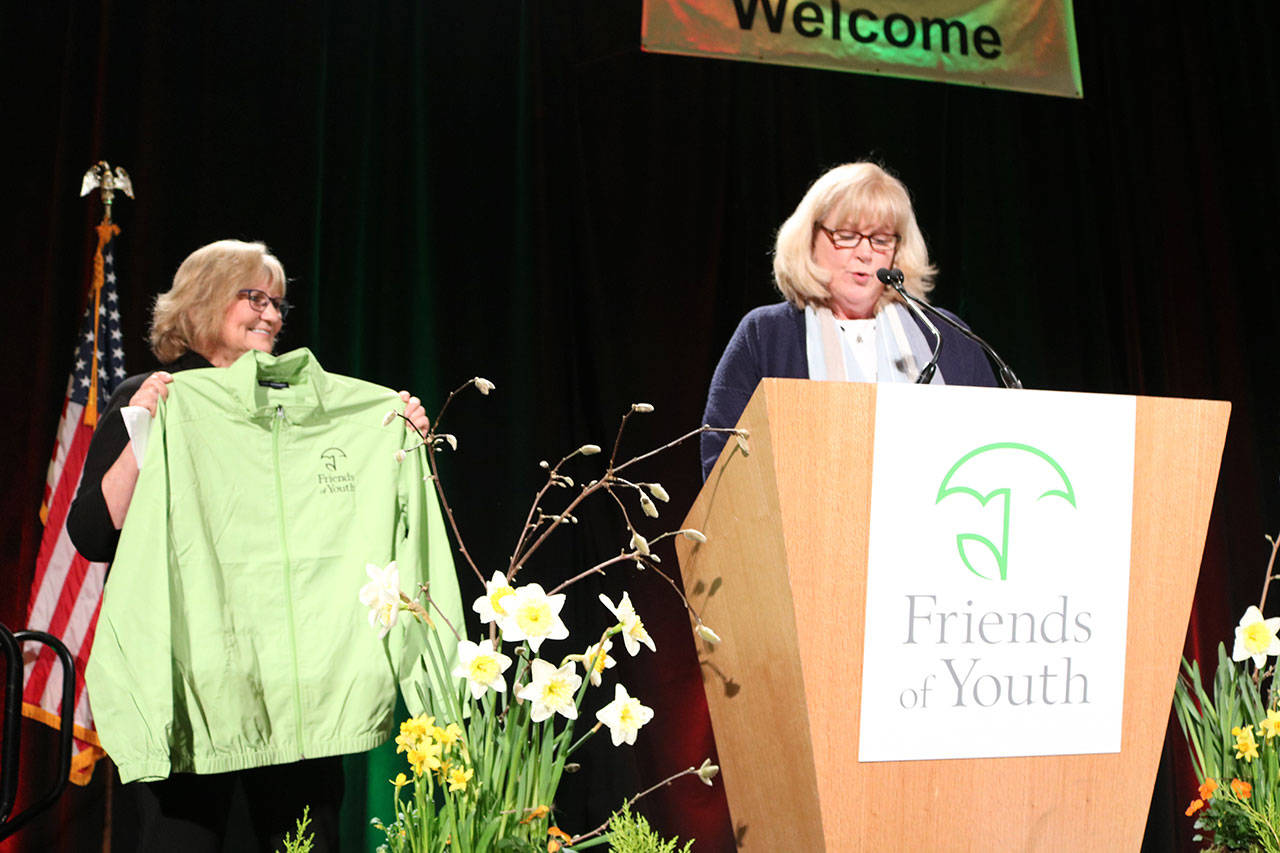 Washington state’s First Lady Trudy Inslee and Friends of Youth CEO and Islander Terry Pottmeyer speak at the March 15 Celebration of Youth fundraiser. Samantha Pak/Redmond Reporter