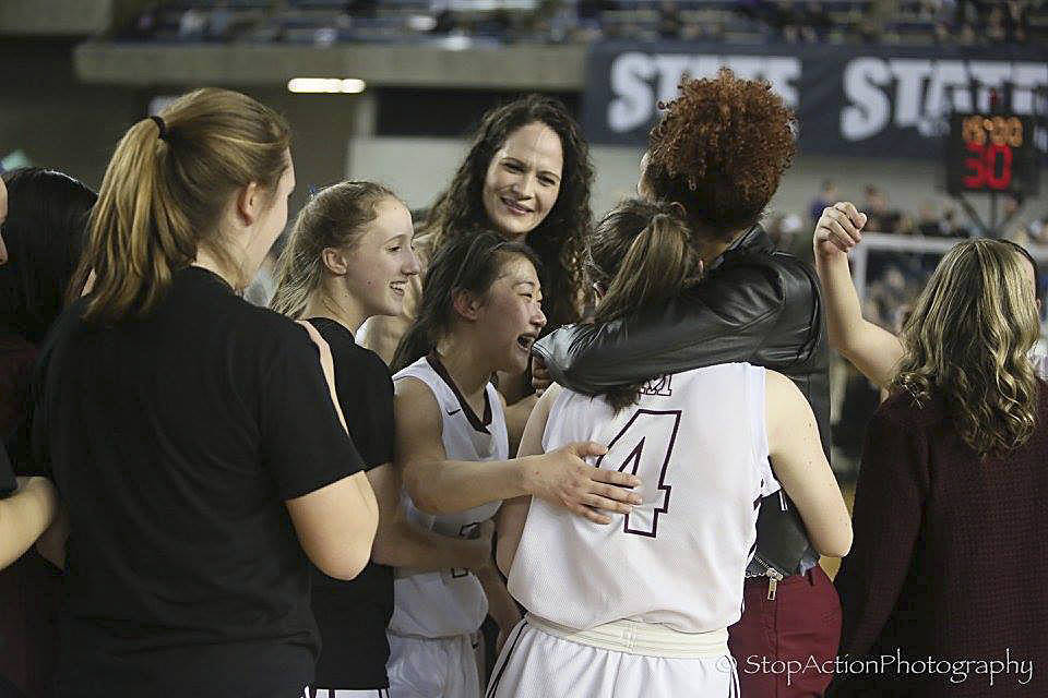 Photo courtesy of Don Borin/Stop Action Photography                                The Mercer Island Islanders celebrate after defeating the Bishop Blanchet Braves 52-47 in the Class 3A girls state championship game on March 4 at the Tacoma Dome.