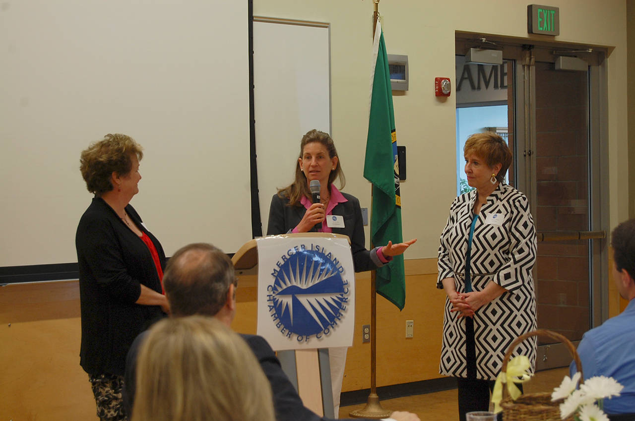 Rep. Tana Senn speaks with Rep. Judy Clibborn (left) and Sen. Lisa Wellman at the June 1 Chamber of Commerce luncheon at the Mercer Island Community and Event Center. Katie Metzger/staff photo