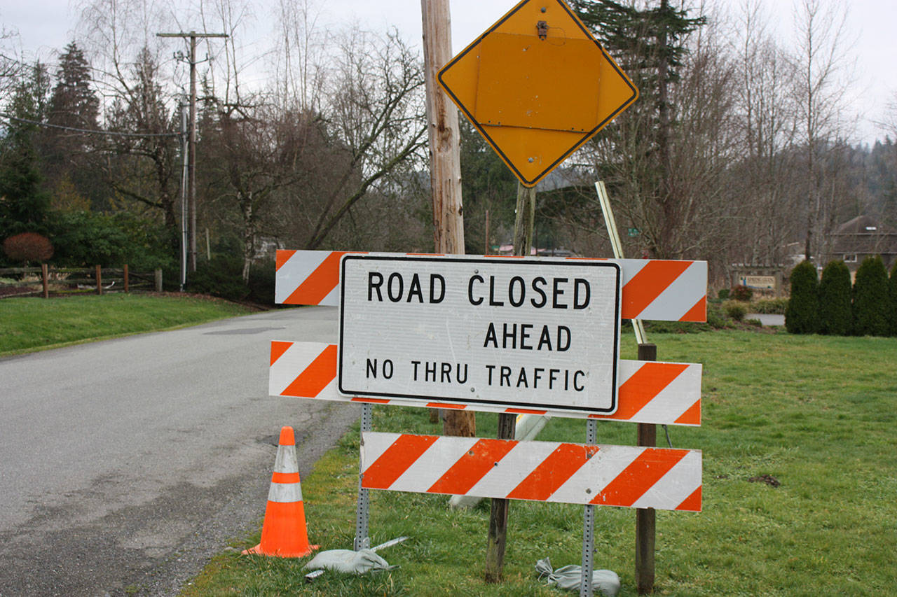 A road closed sign along SE Fish Hatchery Road near Fall City. Aaron Kunkler/staff photo