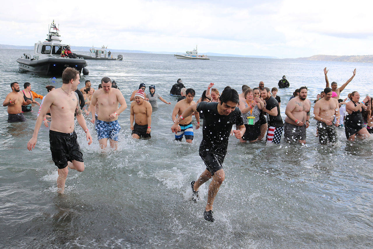 Polar plungers brave the chilly waters off Alki Beach as part of a Special Olympics Washington fundraiser. Katie Metzger/staff photo