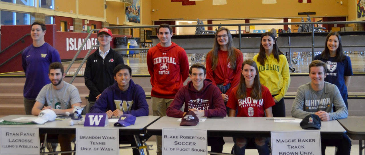 Mercer Island High School conducted a signing day ceremony for its collegiate bound student athletes on March 19 in the Mercer Island High School commons. Athletes moving on to compete at the collegiate level consist of Stew Vassau (lacrosse-University of Utah), Cole Miller (baseball-University of Washington), Natalie Wilson (softball-Loyola Marymount University), Lina Winiski (rowing-Washington State University), Alex Kaczor (soccer-Central College), Jordan Snyder (soccer-University of Oregon), James Richardson (swimming-Massachusetts Institute of Technology), Grace Fujinaga (lacrosse-University of Pennsylvania), Donnie Howard (lacrosse-Boston University), Ryan Payne (lacrosse-Illinois Wesleyan), Brandon Wong (tennis-University of Washington), Blake Robertson (soccer-University of Puget Sound), Matthew Capone (soccer-Northwest Nazarene), Maggie Baker (track-Brown University) and Teague Conder (baseball-Whitman College).                                Photo courtesy of Craig Degginger