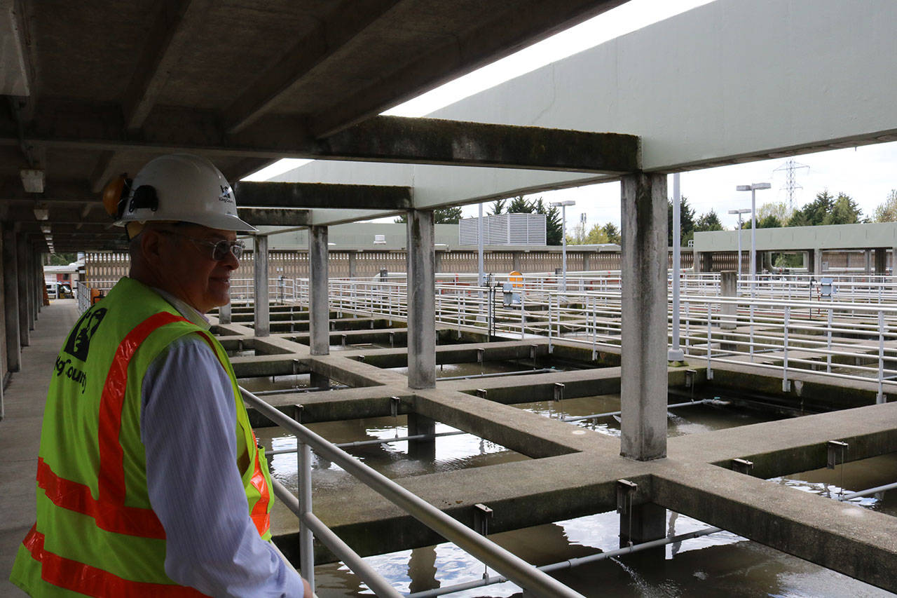 Jim Pitts stands on walkway overlooking filtration chambers at the King County South Filtration Plant in Renton. Aaron Kunkler/staff photo