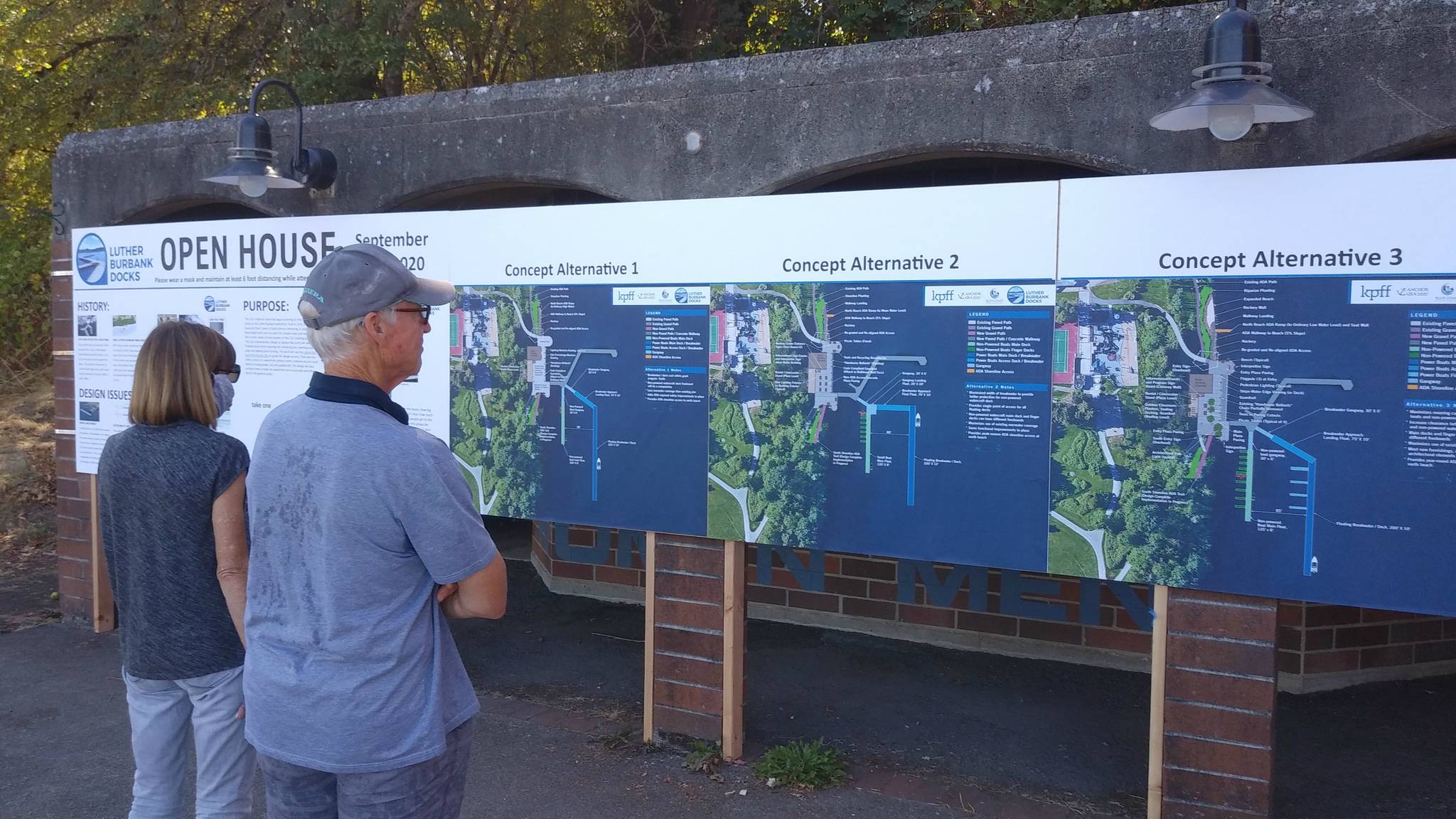 Visitors at the Luther Burbank docks peruse the display of design project alternatives. Courtesy photo