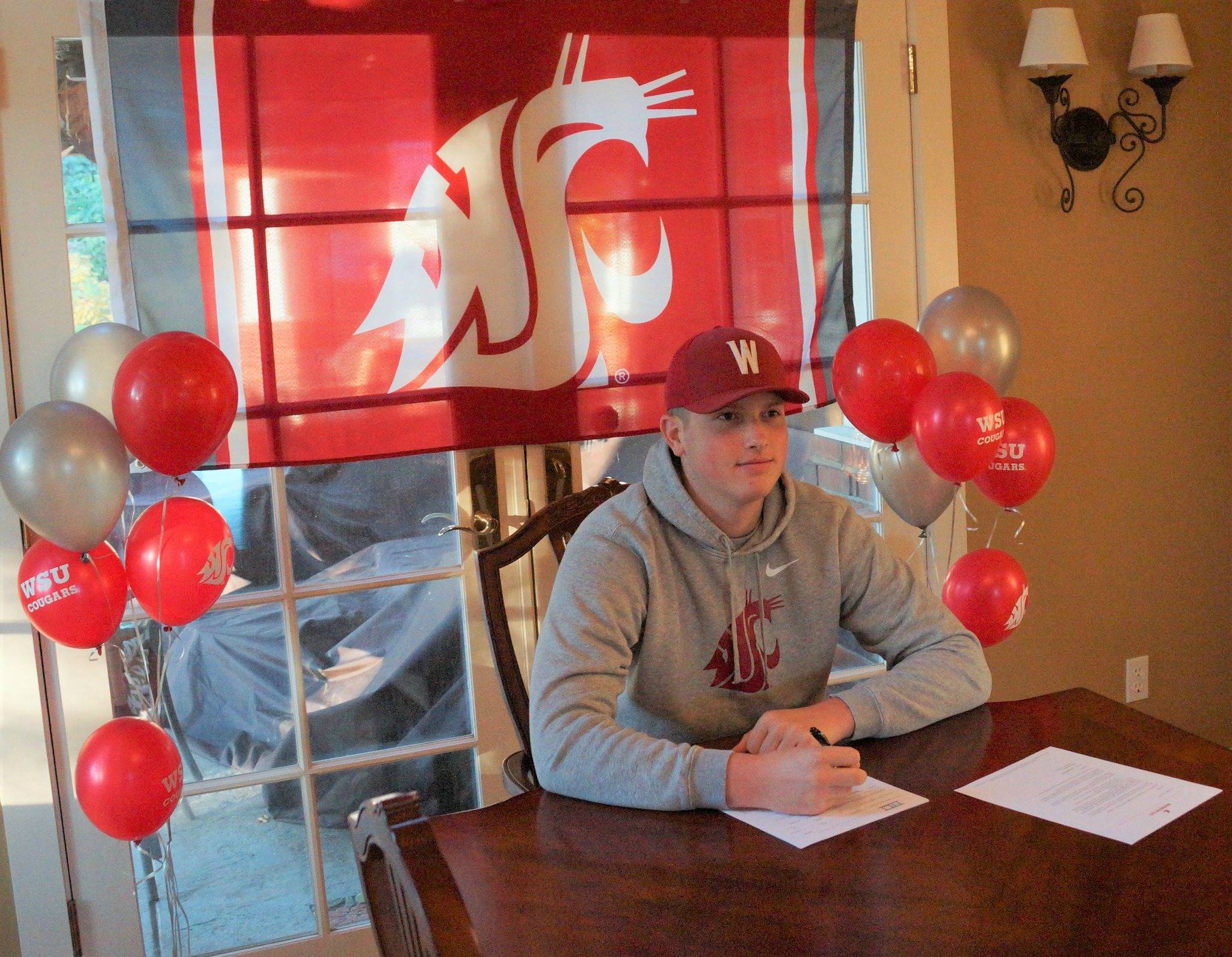 Mercer Island High School senior pitcher/first baseman Jack DeDonato signed a letter of intent on Nov. 11 to play baseball for Washington State University. The 6-foot-3 lefty wrote on his Twitter page: “Couldn’t be more proud to be a Coug! Thanks to all the coaches who helped me along the way.” Photo from Jack DeDonato’s Twitter page