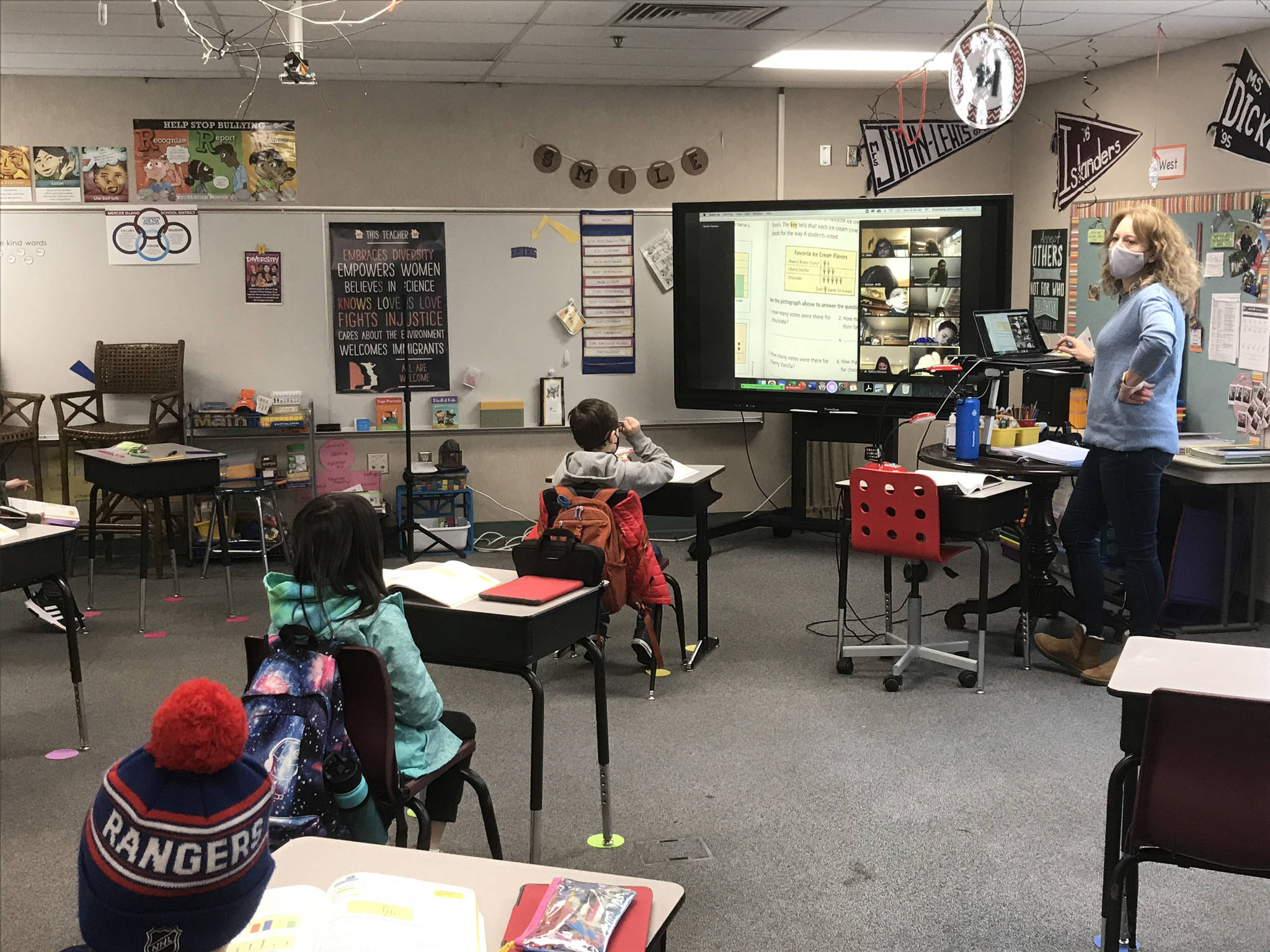 An Island Park Elementary teacher and her students hit the books on Feb. 8. Courtesy of the Mercer Island School District