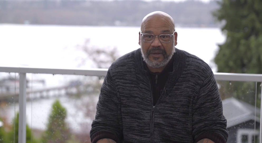 Kelly John-Lewis speaks about raising his two kids on Mercer Island during the virtual Mercer Island Youth and Family Services Foundation fundraising breakfast on Feb. 10. Zoom screen shot